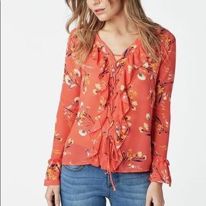 Floral long sleeve top with lace up front